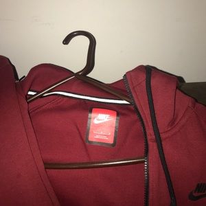 maroon nike tech suit